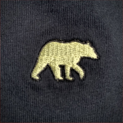 Close up of Embroidered bear design on a navy tshirt by Shoreditch and Hale 