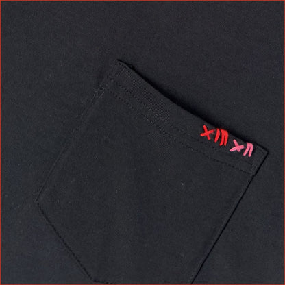 close up image of a men's soft cotton navy pocket tshirt with contrast red stitching on the chest. Minimalist and understated design by shoreditch and hale.